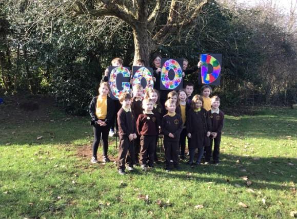 Children of Madresfield celebrating our GOOD Ofsted report